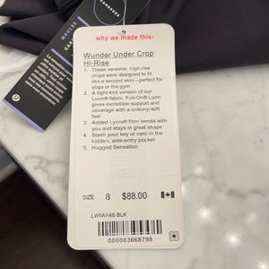Lululemon Wunder Under Crop Hi-Rise in black, never worn with tags. Size 8